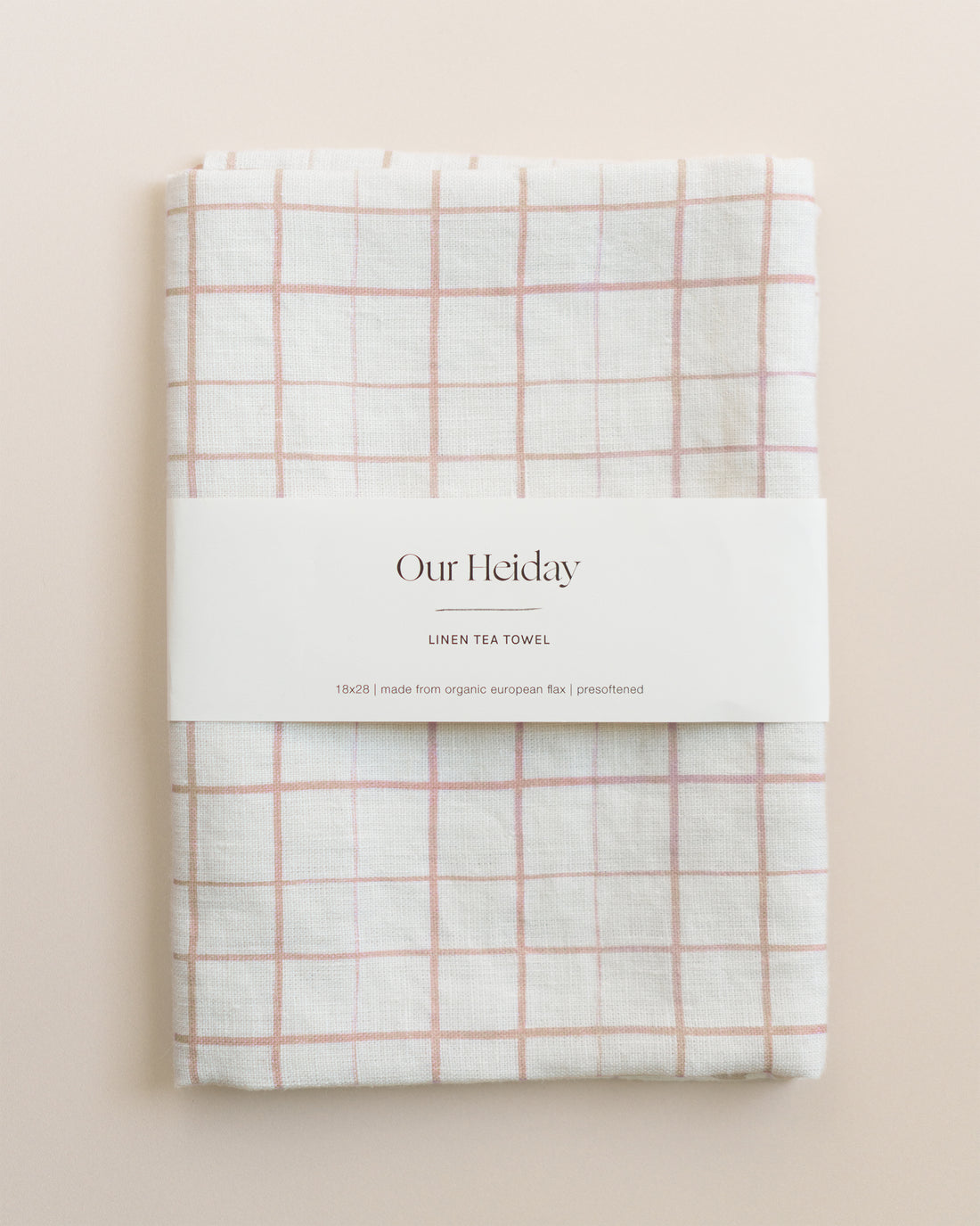 our heiday linen tea towel loose grid pink sand