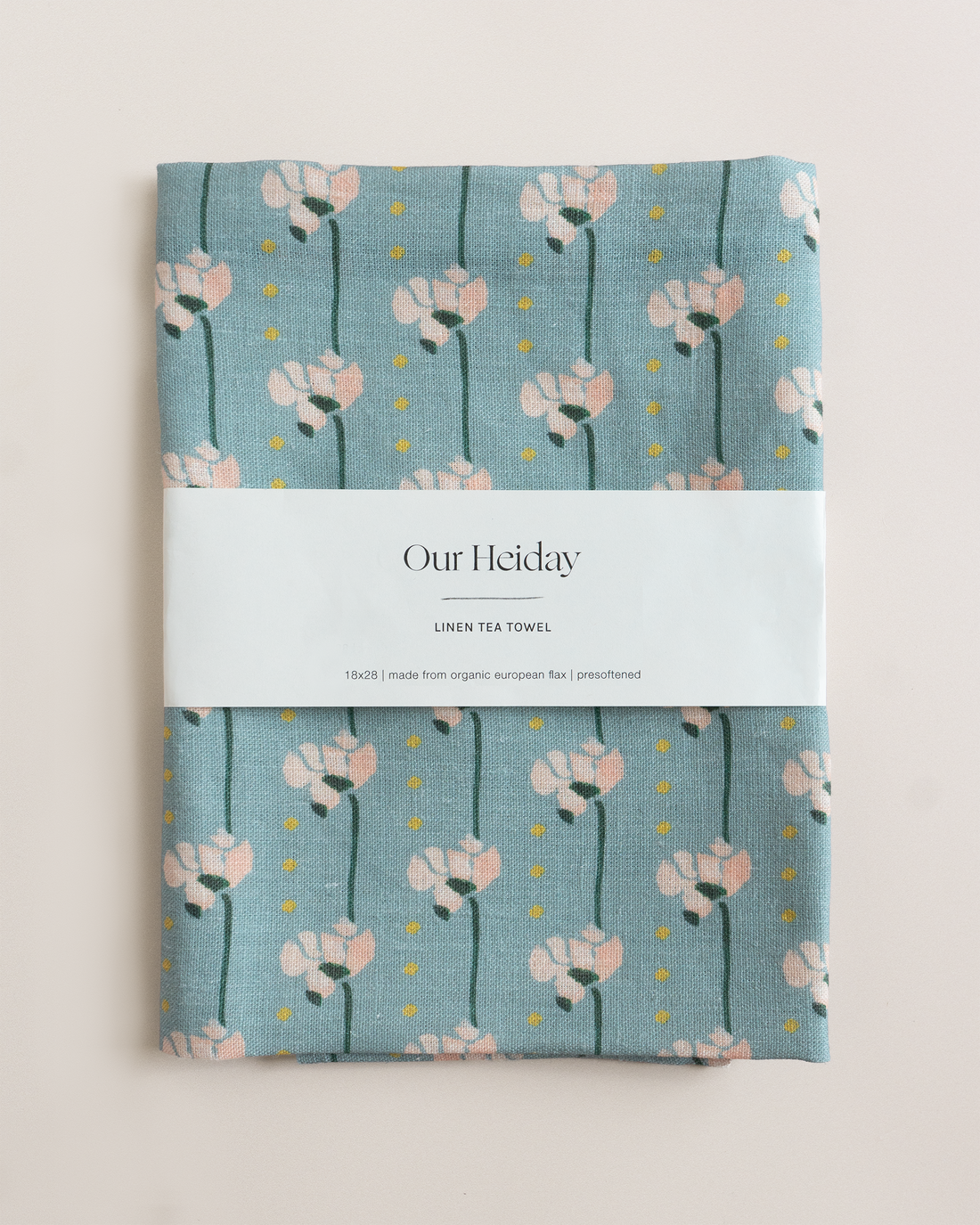 Linen tea towel with floral pattern 